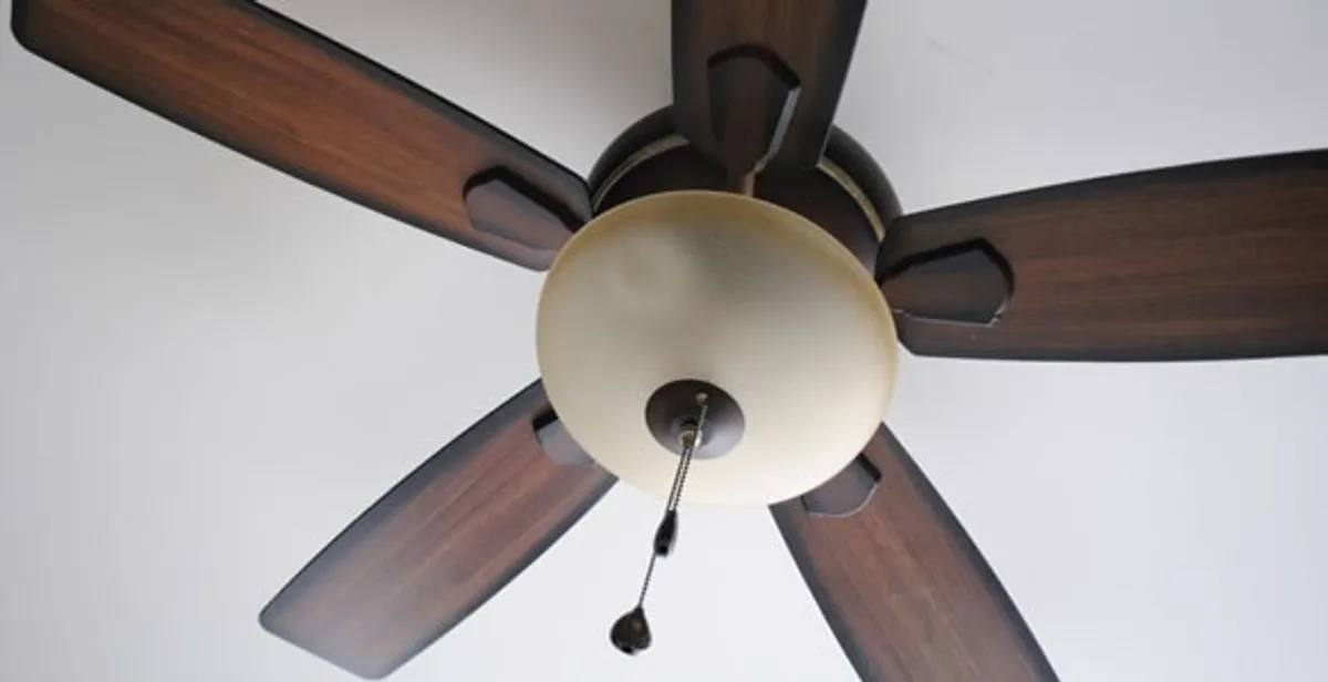 Fully installed ceiling fan with balanced blades and light fixture in Chicago, IL
