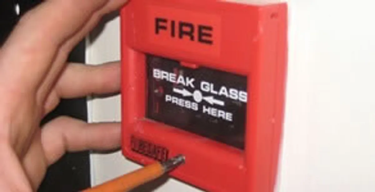 fire alarm installation service showing manual fire alarm pull station installed by licensed electricians in Chicago, IL